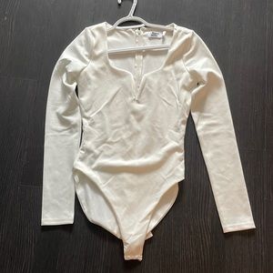 White tiger mist long sleeve bodysuit. Worn once